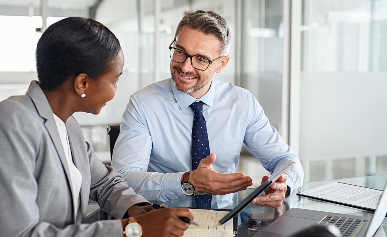 Consultants discussing business Consultants discussing business