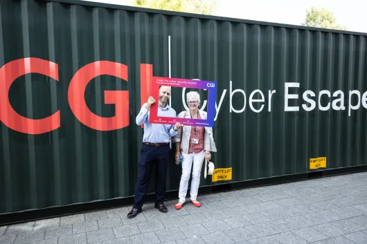 Man and woman outside CGI Cyber Escape