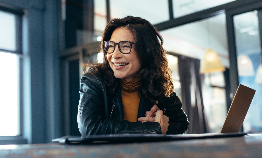 women in the office smiling 