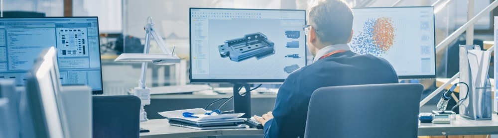 Man working at a computer Man working at a computer