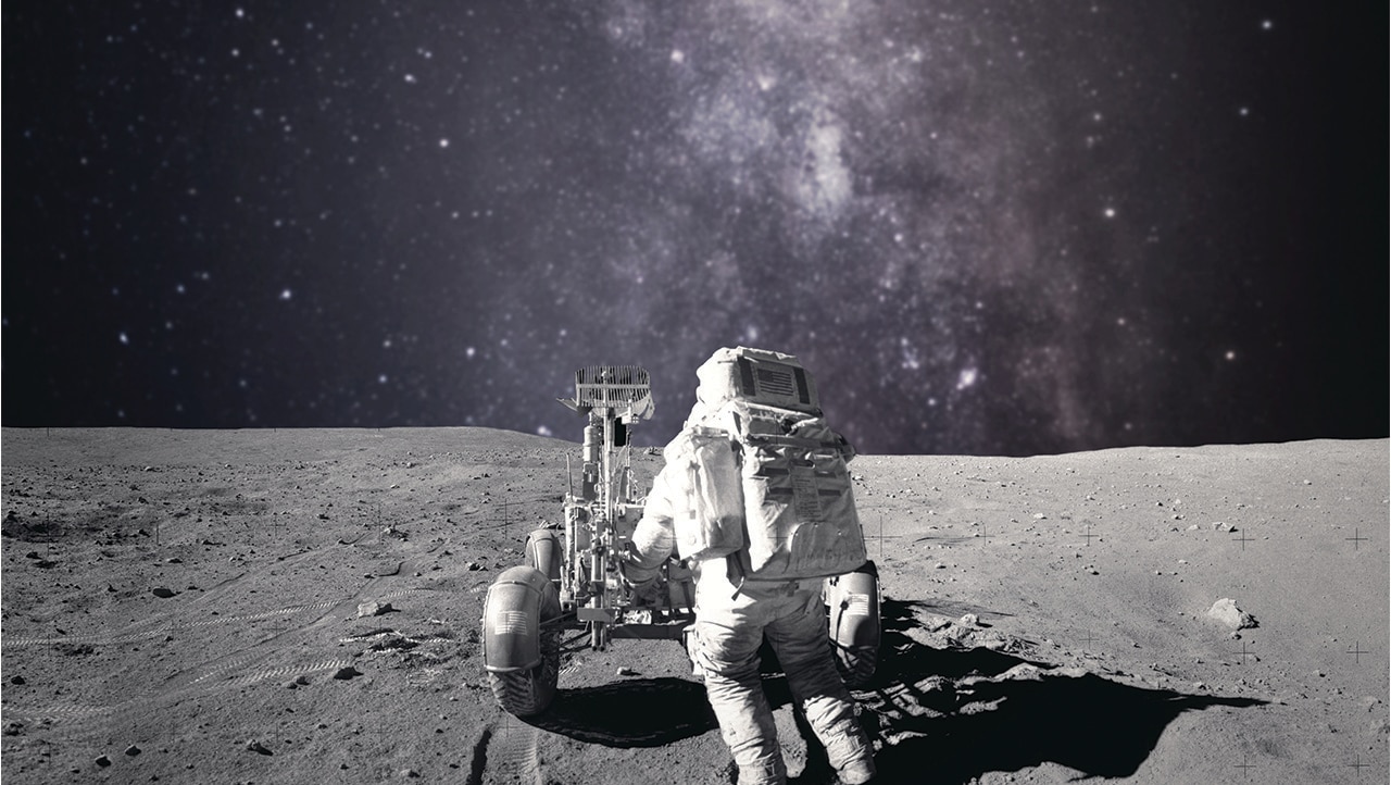 Astronaut explores surface of moon Astronaut explores surface of moon