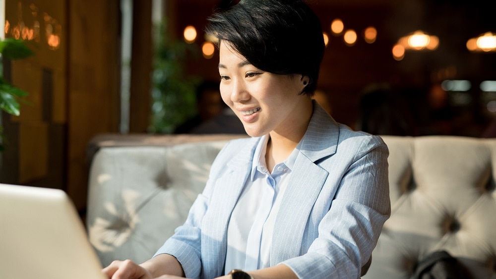 credit-operations-medium Person working on laptop in casual setting