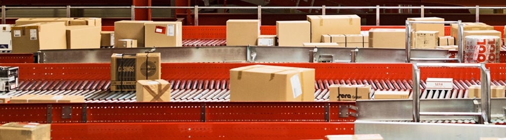 Packages on conveyor belt