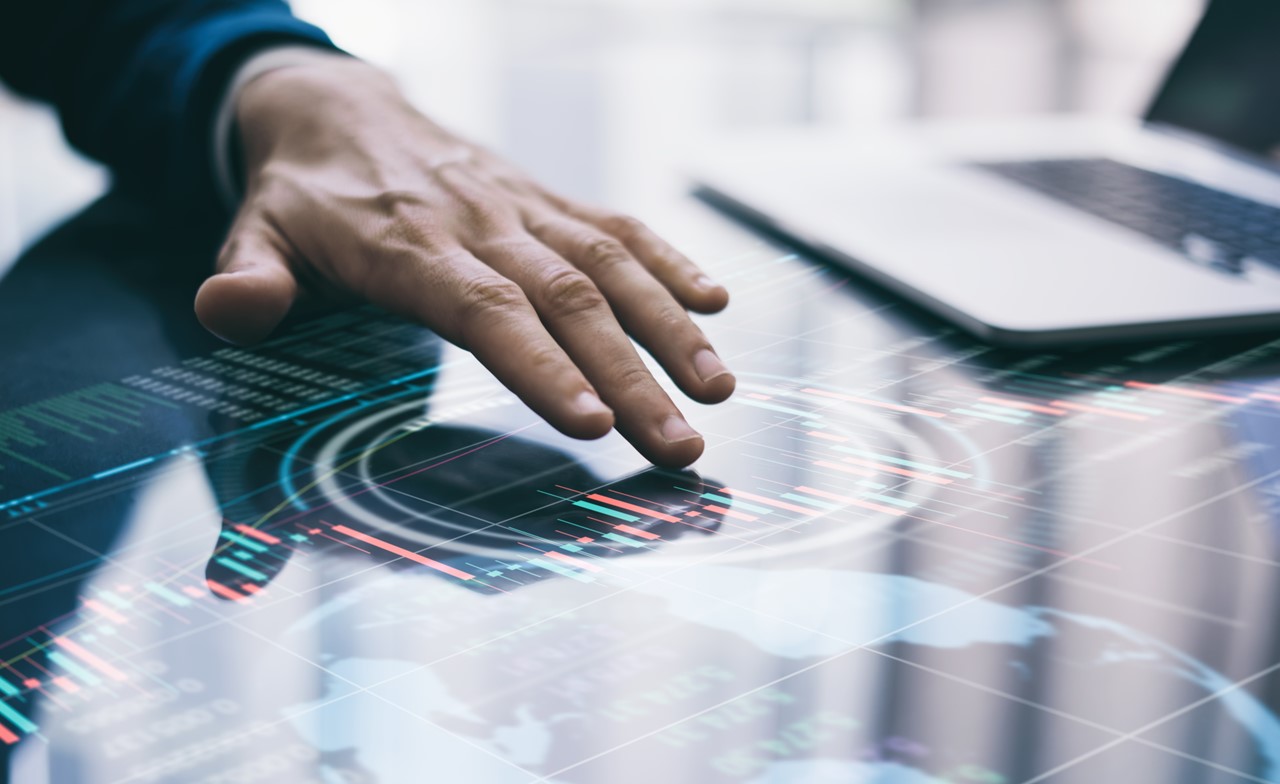 A hand touching a smart screen