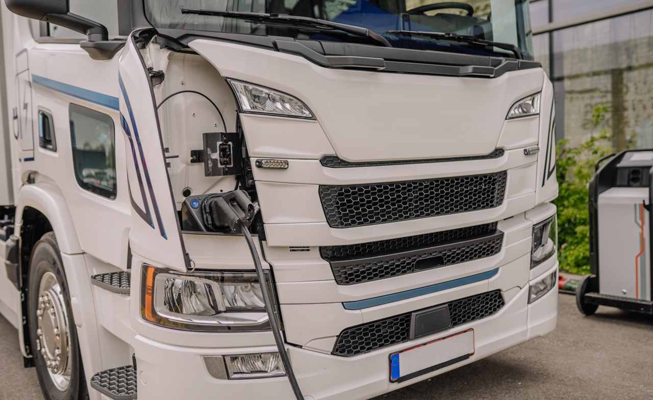 Lorry plugged in to electric charger