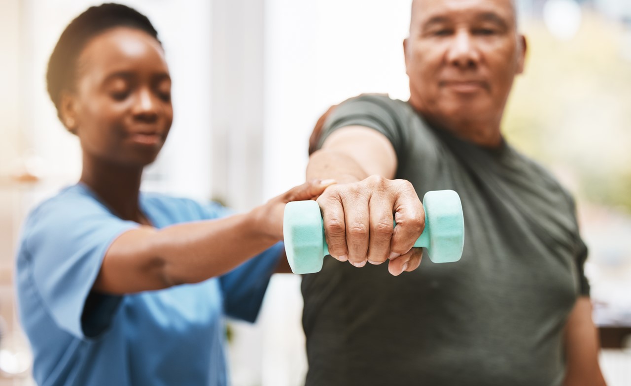 Physiotherapist treating a patient