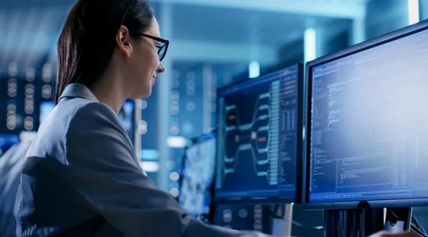 Female IT professional working on computer 