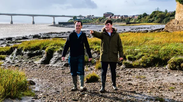 two men standing in the severn estuary seagrass bed