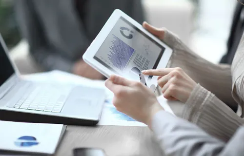 Business team using a digital tablet