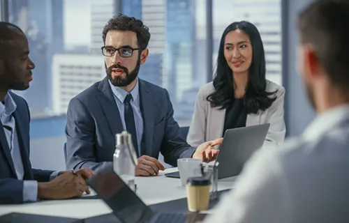 A team in a conference room having a meeting 