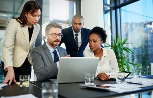 Cropped shot of a group of business colleagues meeting in the boardroom.