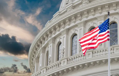 The U.S. flag flying over the Capitol