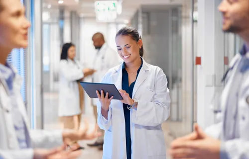 doctor holding tablet device