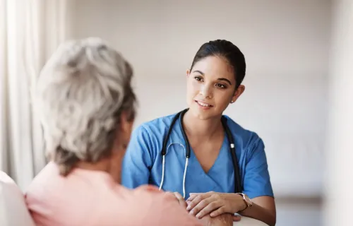 Healthcare professional talking to patient