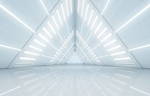 Vit absrakt bild inuti en futuristisk byggnad med triangelvinklade väggar 
