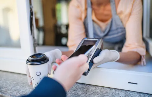 Man making fast food payment