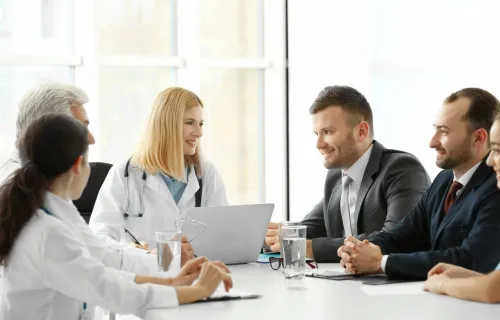 medical professionals meeting in a boardroom