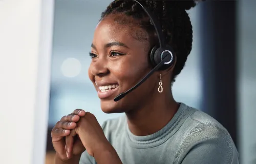 Smiling service desk worker