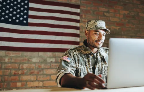 Solider using a computer