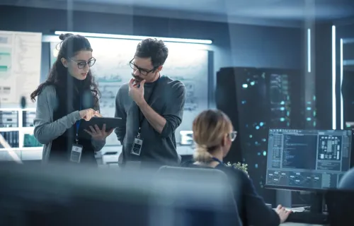 Two engineers troubleshooting