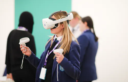 Teenager using VR headset in a school setting