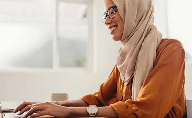 Muslim business woman working from home