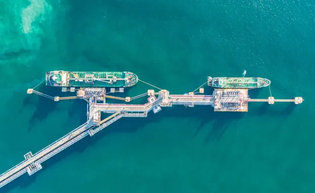 aerial view of a port with loaded cargo ships