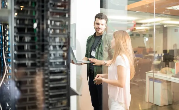 Cloud consultants in server room