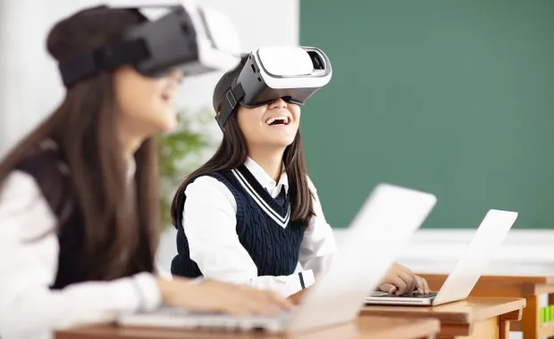School children wearing VR headset
