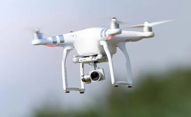 Drone flying through air