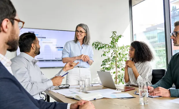 Woman in discussion with her collegues