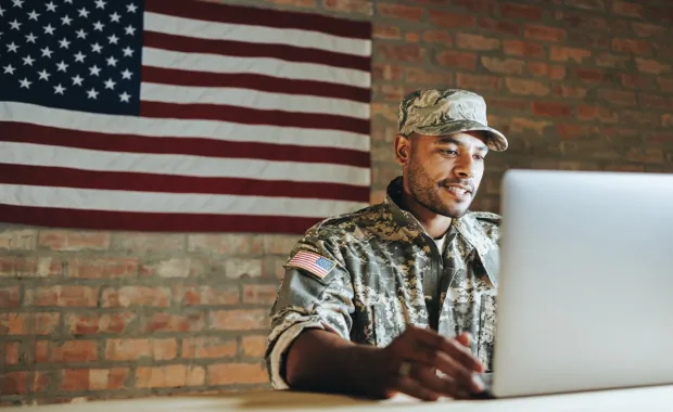 Solider using a computer