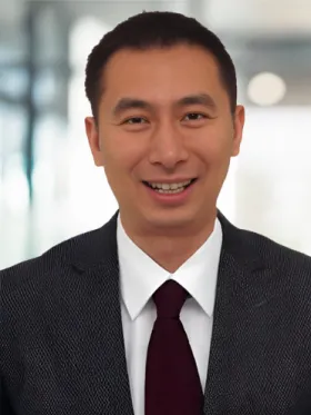 headshot of Eric Chen