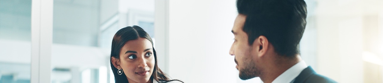 two-businesspeople-meeting-633470877 Two business people meeting at a conference table