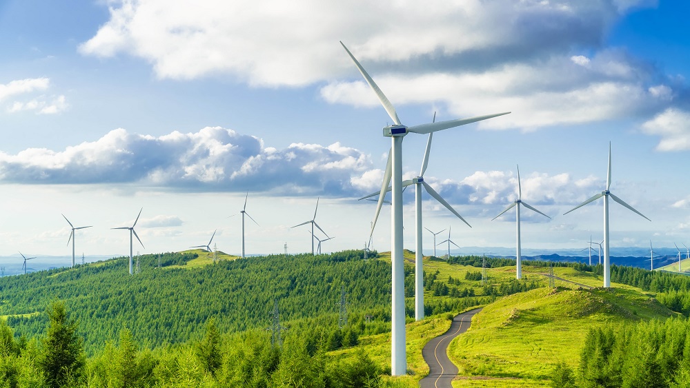 Wind turbines on a mountain range - CGI CSR 2020 Report