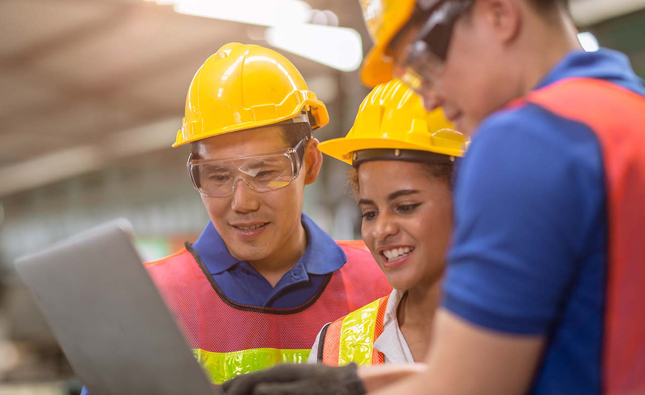 three people in factory three people in factory